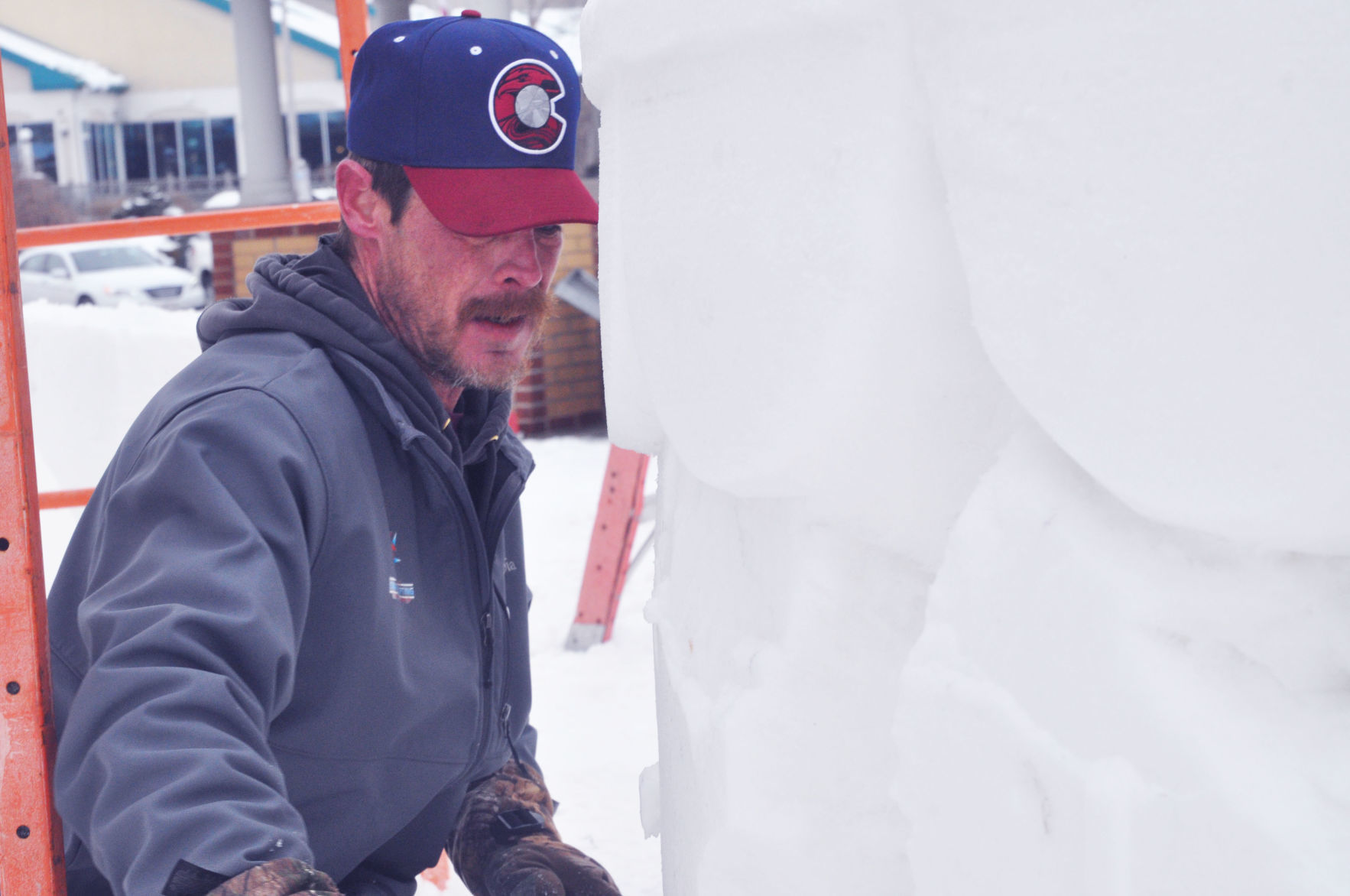 Sculptor performs carving work to sculpture